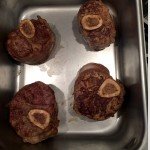 veal shanks in a pan for ossobco