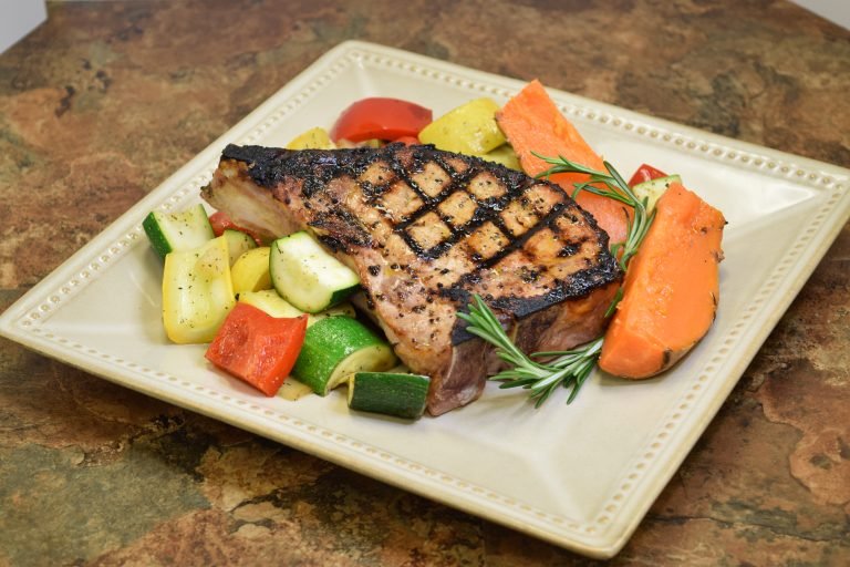 staged plated pork chop for takeout