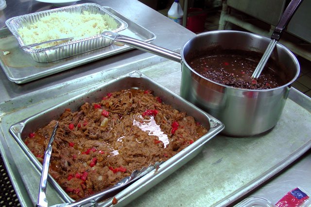 tongue tacko shreaded in pan rice beans