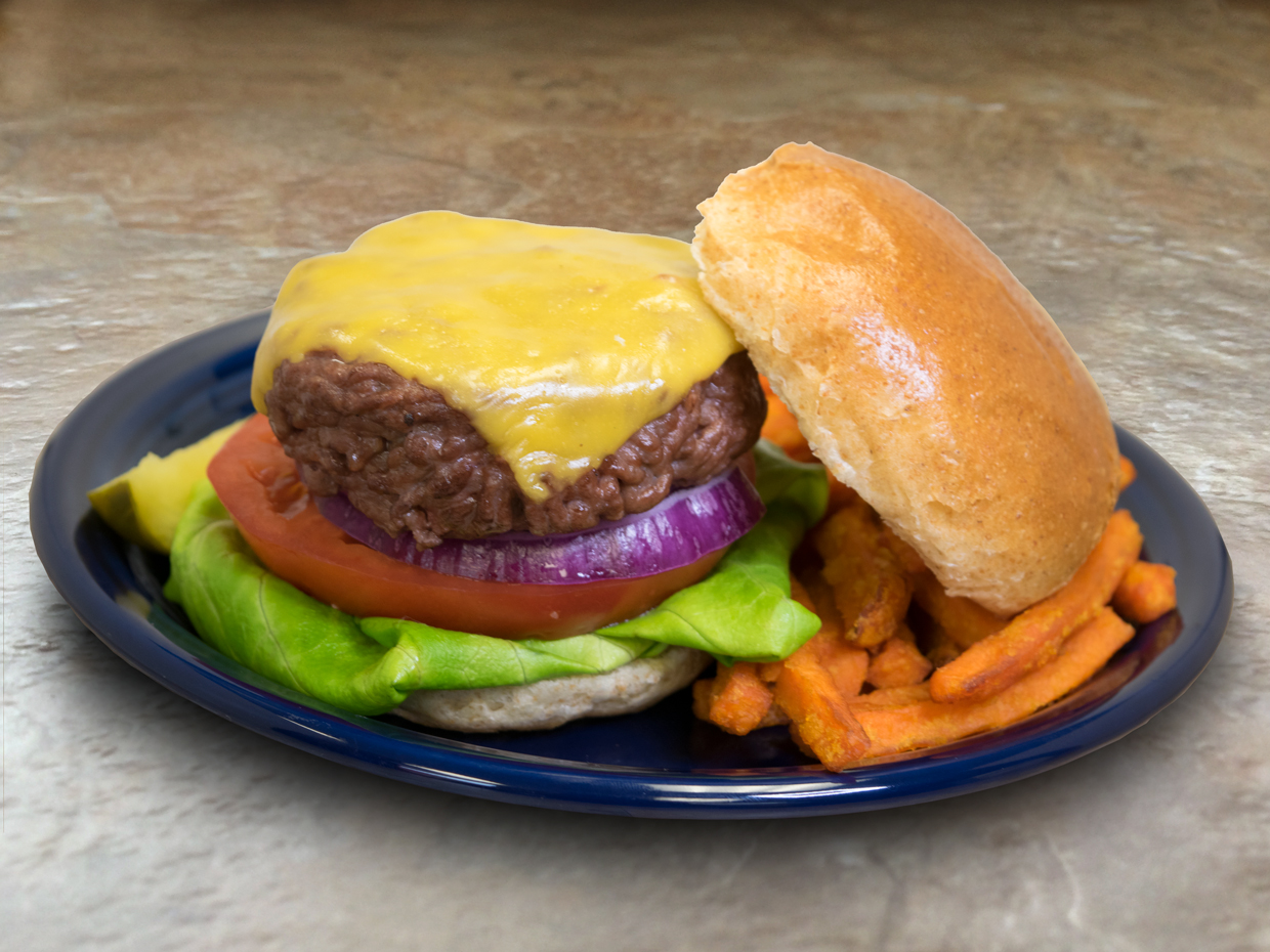 cheeseburger, staged, with sweet potato fries