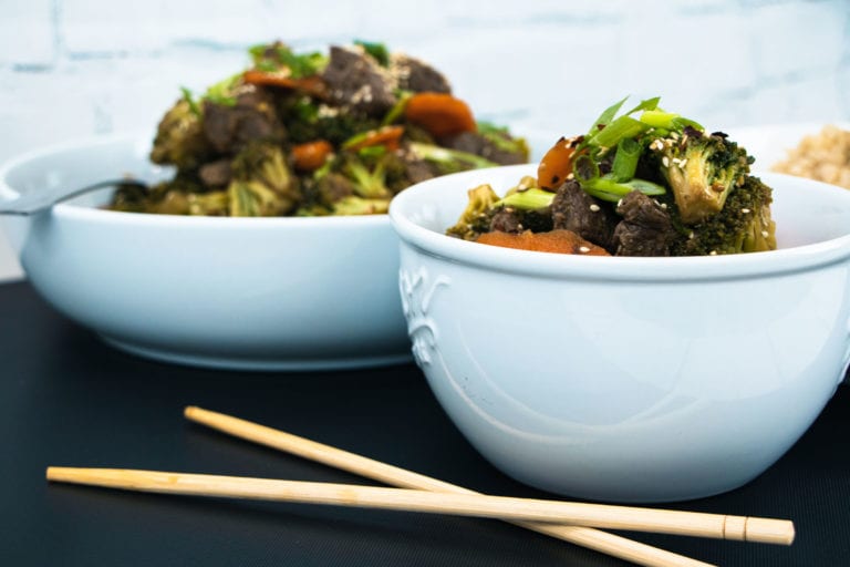 beef and broccoli with chopsticks