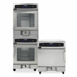 Stacked commercial kitchen ovens in stainless steel finish, featuring multiple cooking compartments for efficient meal preparation.